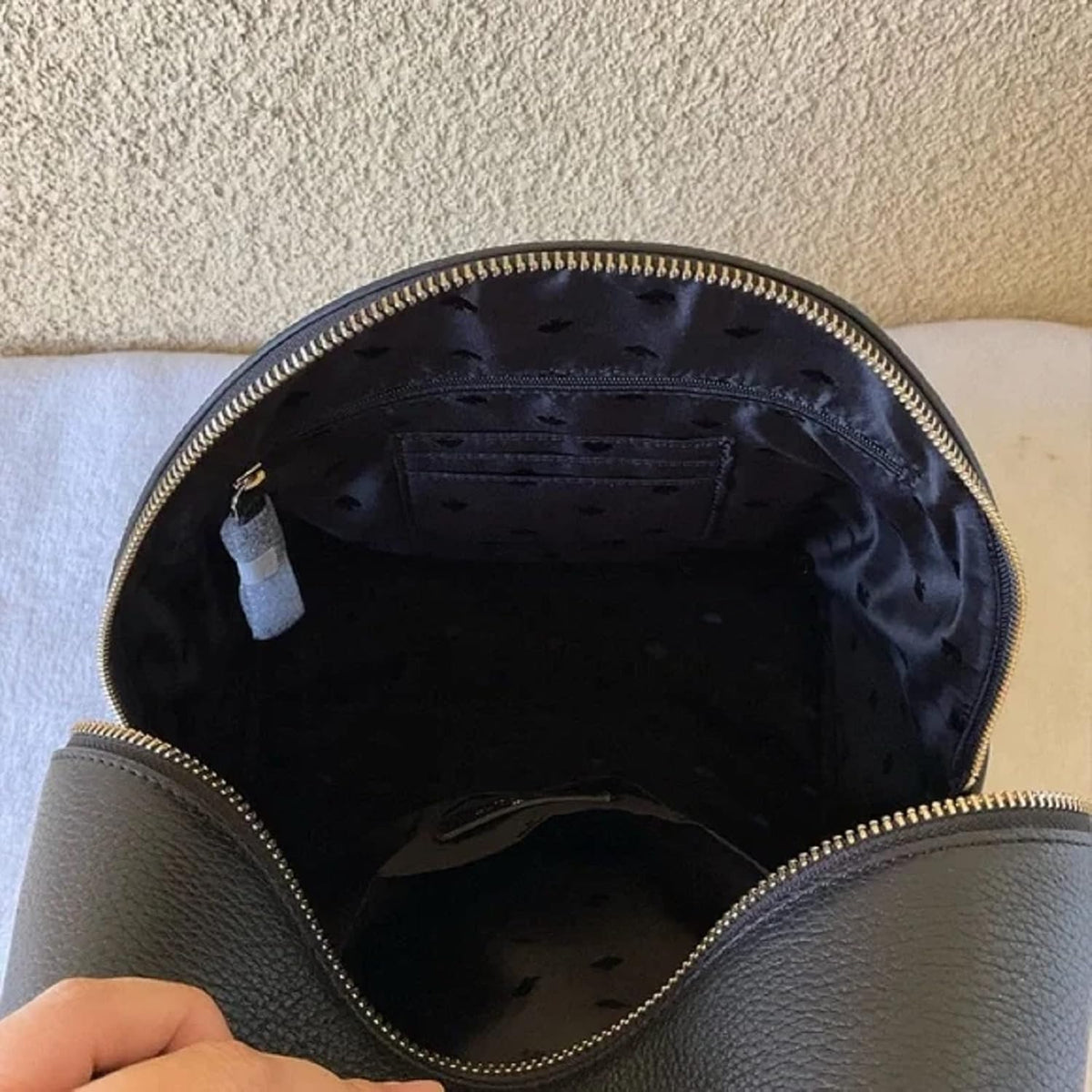 Medium Pebbled Leather Dome Backpack F41682